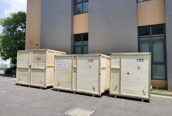 Equipment packed in wooden crates and ready for shipment